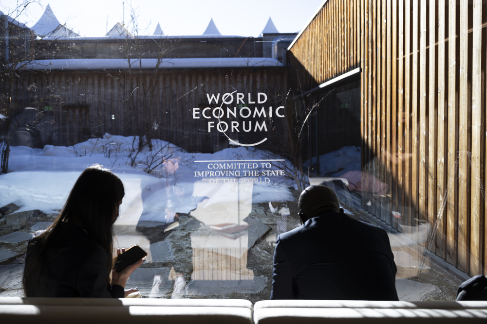 epa11842210 The World Economic Forum (WEF) emblem displayed on a window during the 55th annual World Economic Forum (WEF) meeting in Davos, Switzerland, 21 January 2025. The World Economic Forum's annual meeting gathers entrepreneurs, scientists, and corporate and political leaders in Davos from January 20 to 24.  EPA/LAURENT GILLIERON